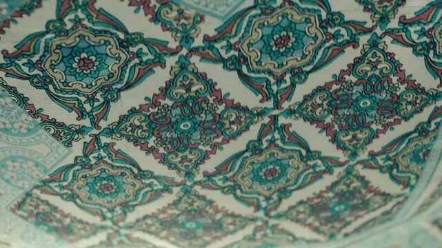 Fabric with beautiful geometric patterns flutters in the wind. Closeup. Macro. Closeup. Macro. Slow mo, slow motion, high speed camera, 200fps