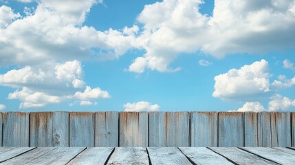 Texture of wooden background and blue sky with room for text.