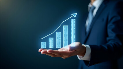 Hand operating holographic growth charts illustrating profit and revenue growth with empty space background concept as A hand manipulating holographic growth charts to display profit and revenue growt