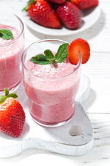 refreshing strawberry milkshake, vertical top view