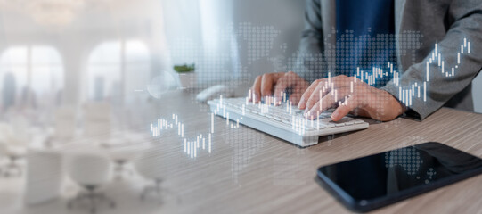 Businessman using tablet and computer to analyze sales data, economic growth chart