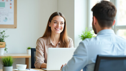 a businesswoman with a laptop in the office interviewing a client