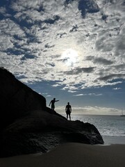 men on the rock