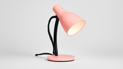 Stylish pink desk lamp on a white background.