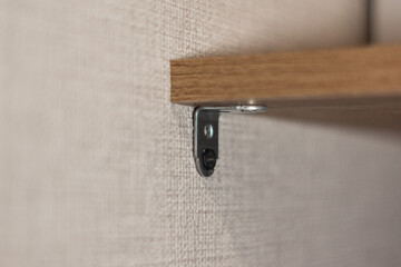 Galvanized steel corners close-up holds a shelf