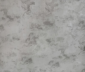 Close up of a grunge or dirt texture of a grey concrete wall. Seamless background texture.