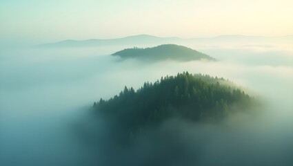 Fototapeta premium Dramatic Fog Rolling Over Mountain Peaks at Sunrise