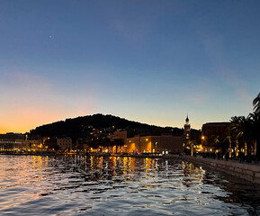 Naklejka premium Beautiful sunset in the harbor of Split, Croatia. Copy space. Concept of relaxation and tranquility. Inner peace. Wallpaper for tourist brochures. Luxury travel in Europe