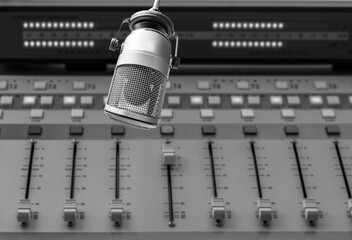 Professional microphone and sound mixer in radio station studio