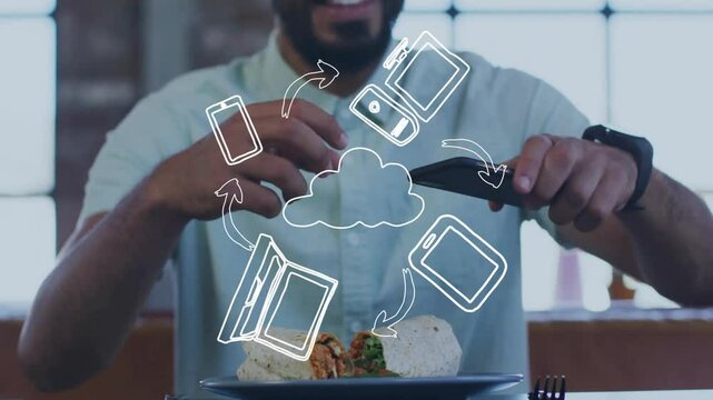 Taking photo of burrito, man using animation with digital cloud icons
