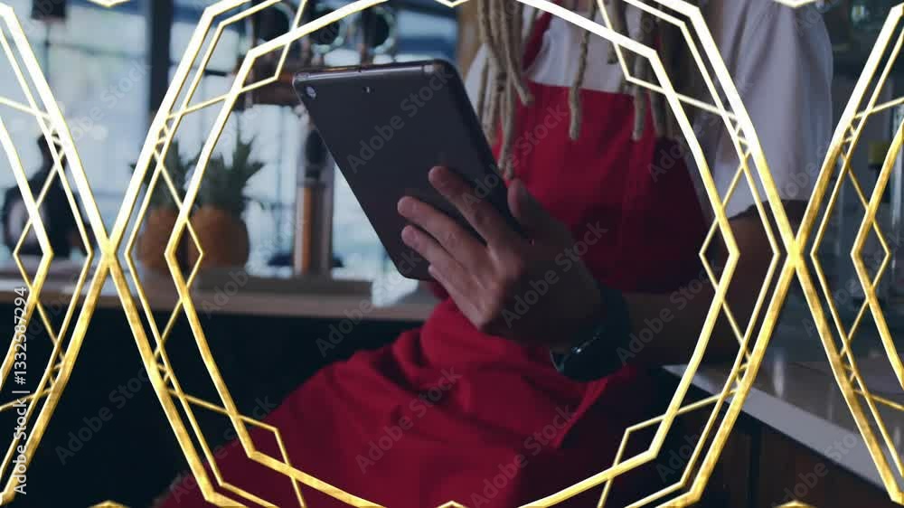 Poster using tablet with animation, person in red apron in school setting