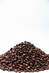 Large mound of dark brown wood pellets against white backdrop , sustainable, eco-friendly