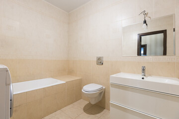 modern bathroom room with toilet and washing machine