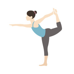 ヨガのダンサーポーズをする団子頭の女性