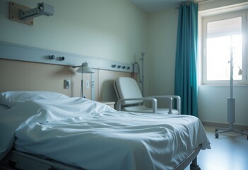  Hospital room with essential medical equipment and a comfortable chair for visitors