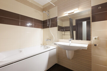 modern bathroom room with toilet and washing machine
