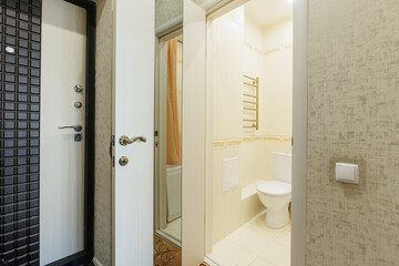 modern bathroom room with toilet and washing machine