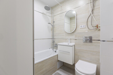 modern bathroom room with toilet and washing machine
