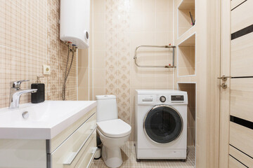 modern bathroom room with toilet and washing machine