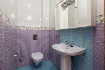 modern bathroom room with toilet and washing machine
