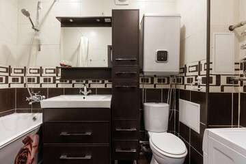modern bathroom room with toilet and washing machine