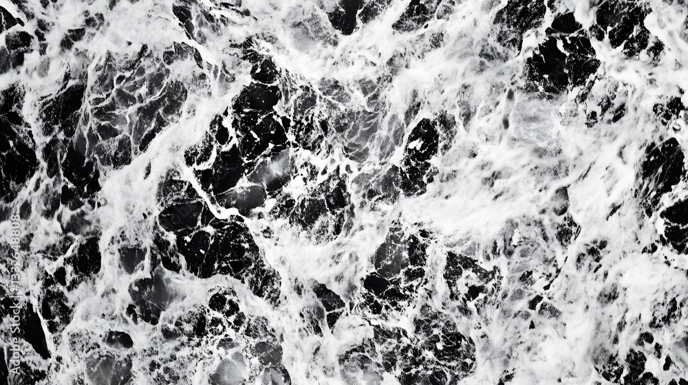 Poster dark ocean water with white sea foam creating a natural abstract design