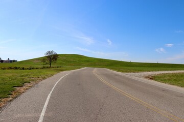 The empty road in the country on a sunny day.