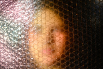 Artistic Portrait Behind Bubble Wrap