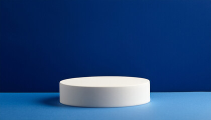 Elegant round white podium against deep blue backdrop. Empty pedestal for product presentation
