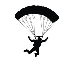 silhouette of a paraglider