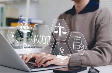 Business audit and compliance concept. Business professional working on laptop with audit and compliance icons, representing financial auditing, risk management, quality control, corporate governance,