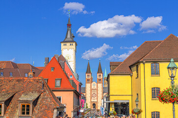 Fototapeta premium Wurzburg old town altstadt with Grafeneckart house town hall Rathaus, Saint Kilian Cathedral, old colorful buildings on Domstrasse street in Wurzburg city historical center, Bavaria state, Germany