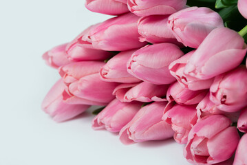 Mothers day, Valentines Day, Birthday celebration concept. Greeting card. Beautiful Bouquet of pink delicate tulips. Copy space for text, top view. Spring background. March 8, International Womens Day