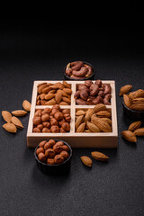 Wooden box with four sections filled with nuts