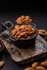 Roasted or raw peeled almonds in bowl