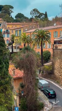 Route du Mimosa - mimosa road on the French Riviera. Medieval town of Bormes-les-Mimosas, France February 25, 2025. High quality 4k footage