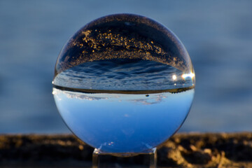 Through the crystal ball - The Burdallo lagoon inside a crystal ball, a dream landscape.