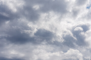 Grey leaden dramatic clouds in the sky.