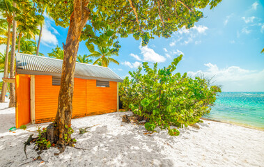 Orange cabin by the sea in a tropical beach