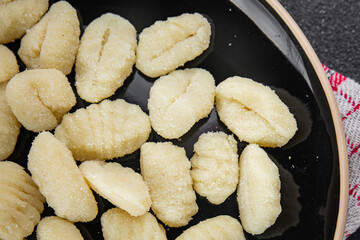 Gnocchi tasty fresh gourmet food background table rustic food top view copy space keto and paleo diet vegetarian and vegan food