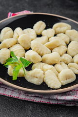 Gnocchi tasty fresh gourmet food background table rustic food top view copy space keto and paleo diet vegetarian and vegan food
