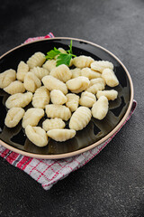 Gnocchi tasty fresh gourmet food background table rustic food top view copy space keto and paleo diet vegetarian and vegan food