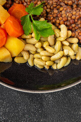 Lentils and vegetables vegetarian main course, bean, potatoe, carrot tasty fresh gourmet food...