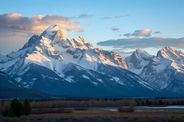 Snow-capped mountain peaks in the morning light.