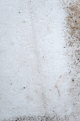 Background, texture of dirty white foam plastic, construction polystyrene.