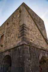 Ruins of the Royal Weapons Factory of Orbaitzeta, located in a leafy and hidden corner of the Irati Forest (Basque Country, Spain) Vertical