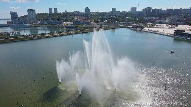 Cheboksary waterfront with fountains and cityscape