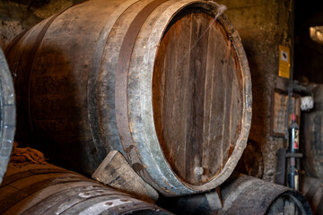 Visit of old caves with oak barrels, wine making on bodegas wineries on volcanic soils of Mount Teide in Tacoronte-Acentejo wine region on Tenerife, Canary islands vacation, Spain
