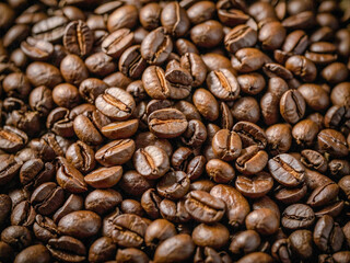 Close-up of roasted coffee beans with cinnamon, aromatic food photography