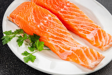 Salmon red fish organic seafood tasty fresh gourmet food background on table rustic food top view copy space